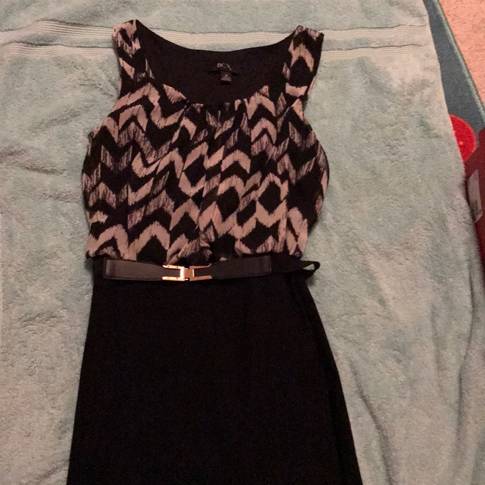 Right on the bottom loose on the top black dress